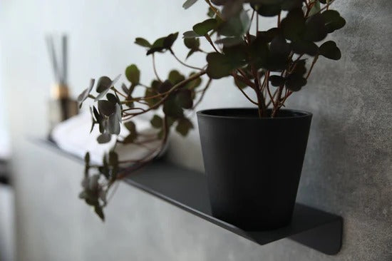 Cosmetic floating shelf in bedroom